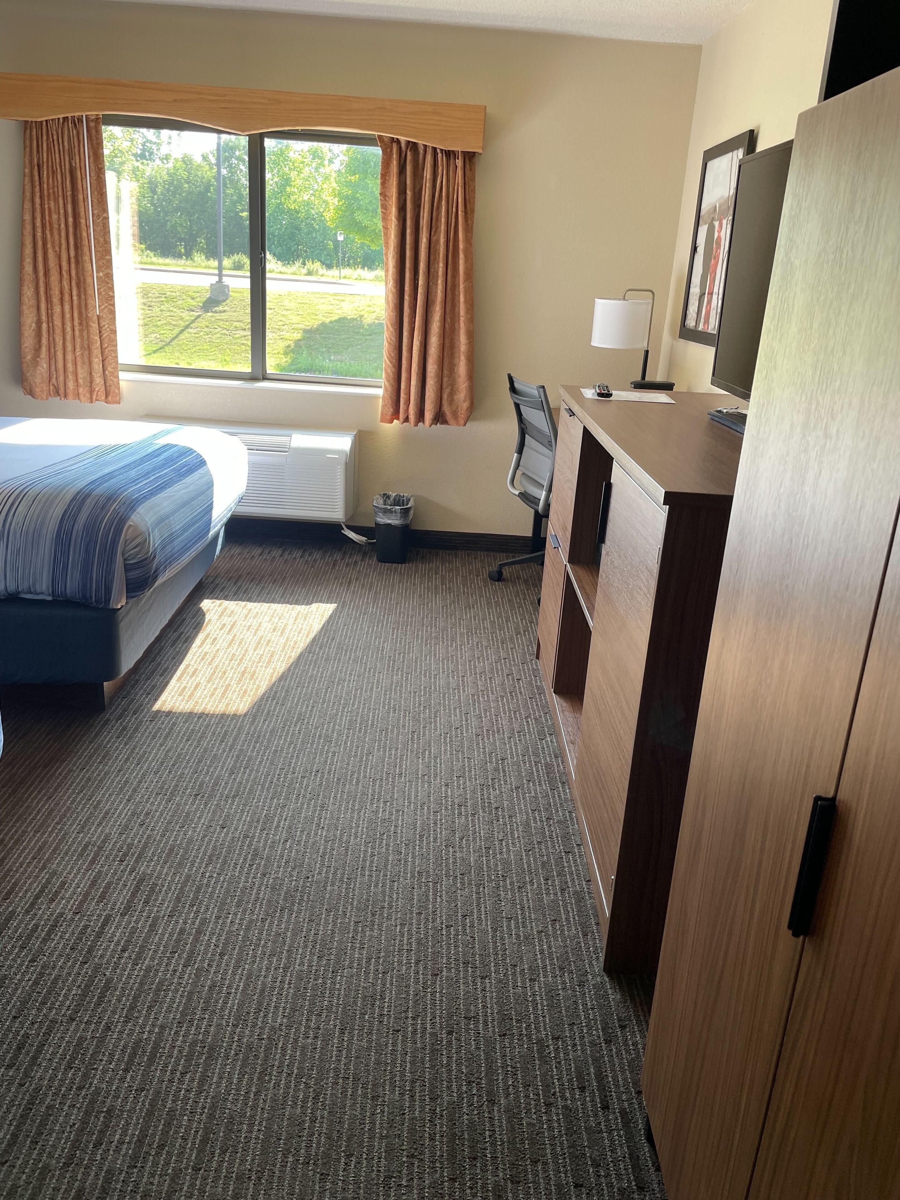 desk, blackout curtains, soundproofing, iron/ironing board