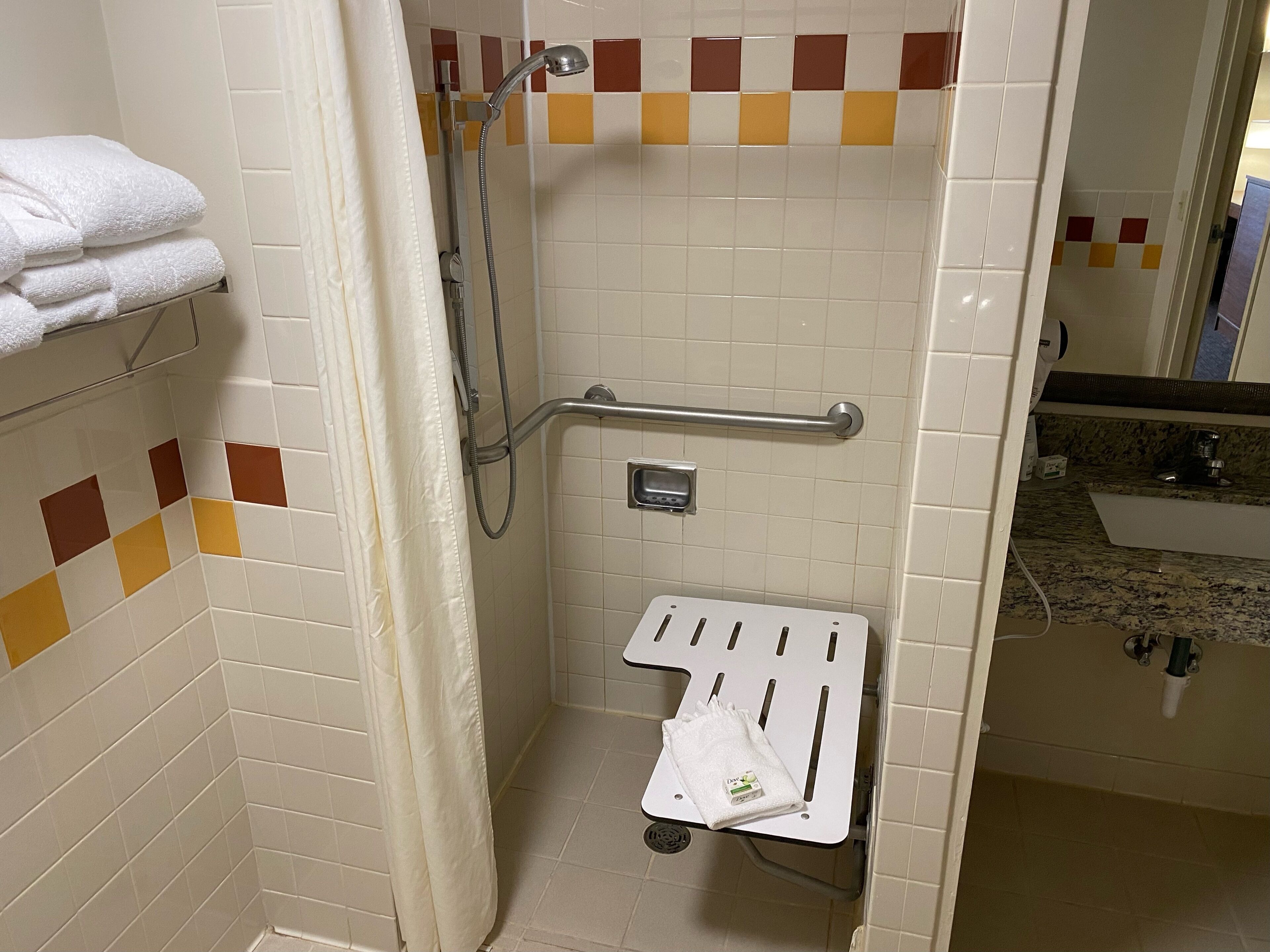 combined shower/bathtub, free toiletries, hair dryer, towels