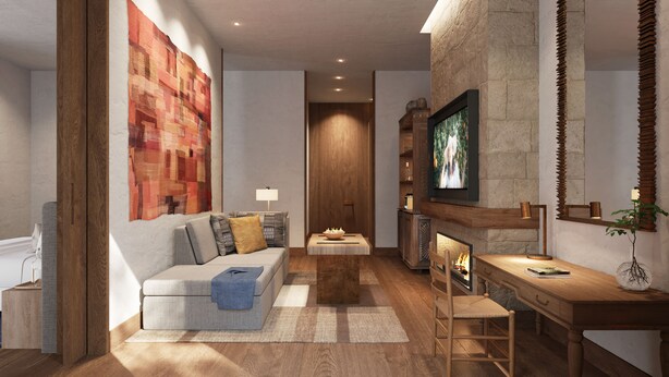 A modern living room with a sofa, coffee table, and a fireplace. - Six Senses Douro Valley (Lamego)