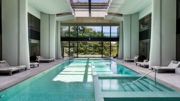 Indoor pool, seasonal outdoor pool, pool umbrellas, pool loungers