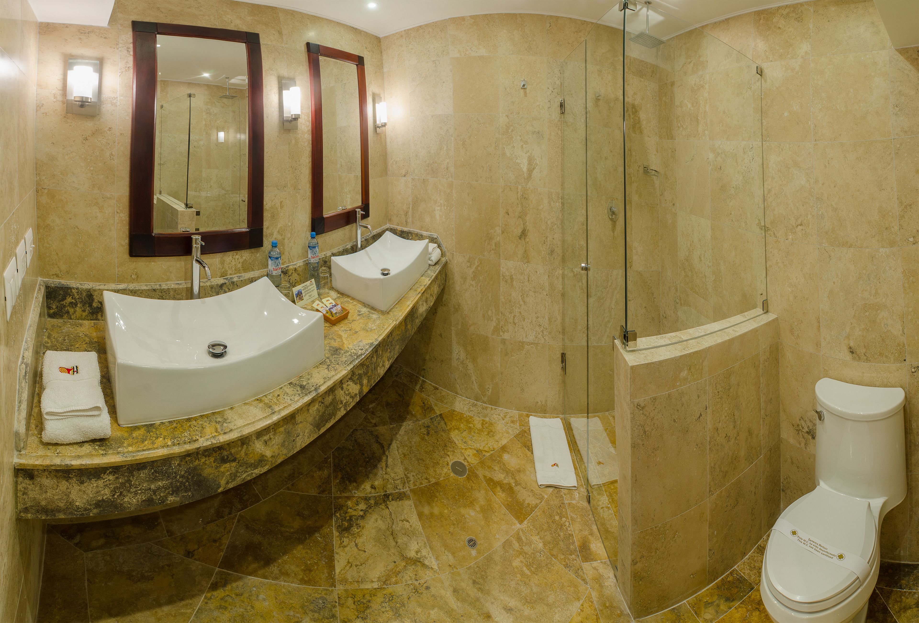 designer toiletries, hair dryer, bathrobes, towels