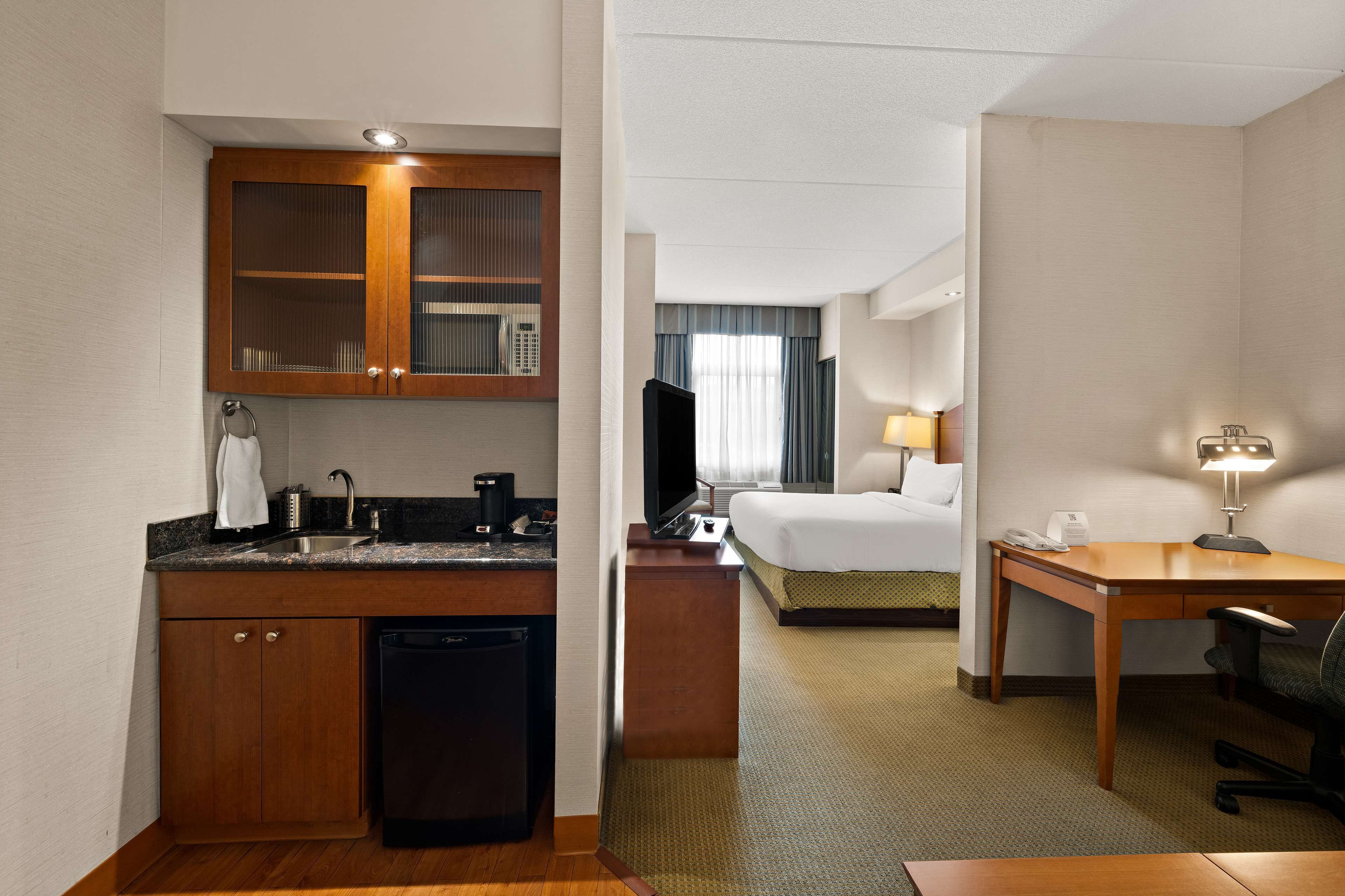 suite, 1 king bed, non smoking, kitchenette (shower only;with sofabed) | private kitchenette | fridge, microwave, coffee/tea maker, cookware/dishes/utensils