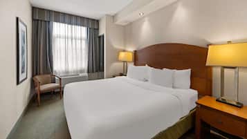 Suite, 1 King Bed, Non Smoking, Kitchenette (Shower Only;with Sofabed) | In-room safe, desk, laptop workspace, iron/ironing board