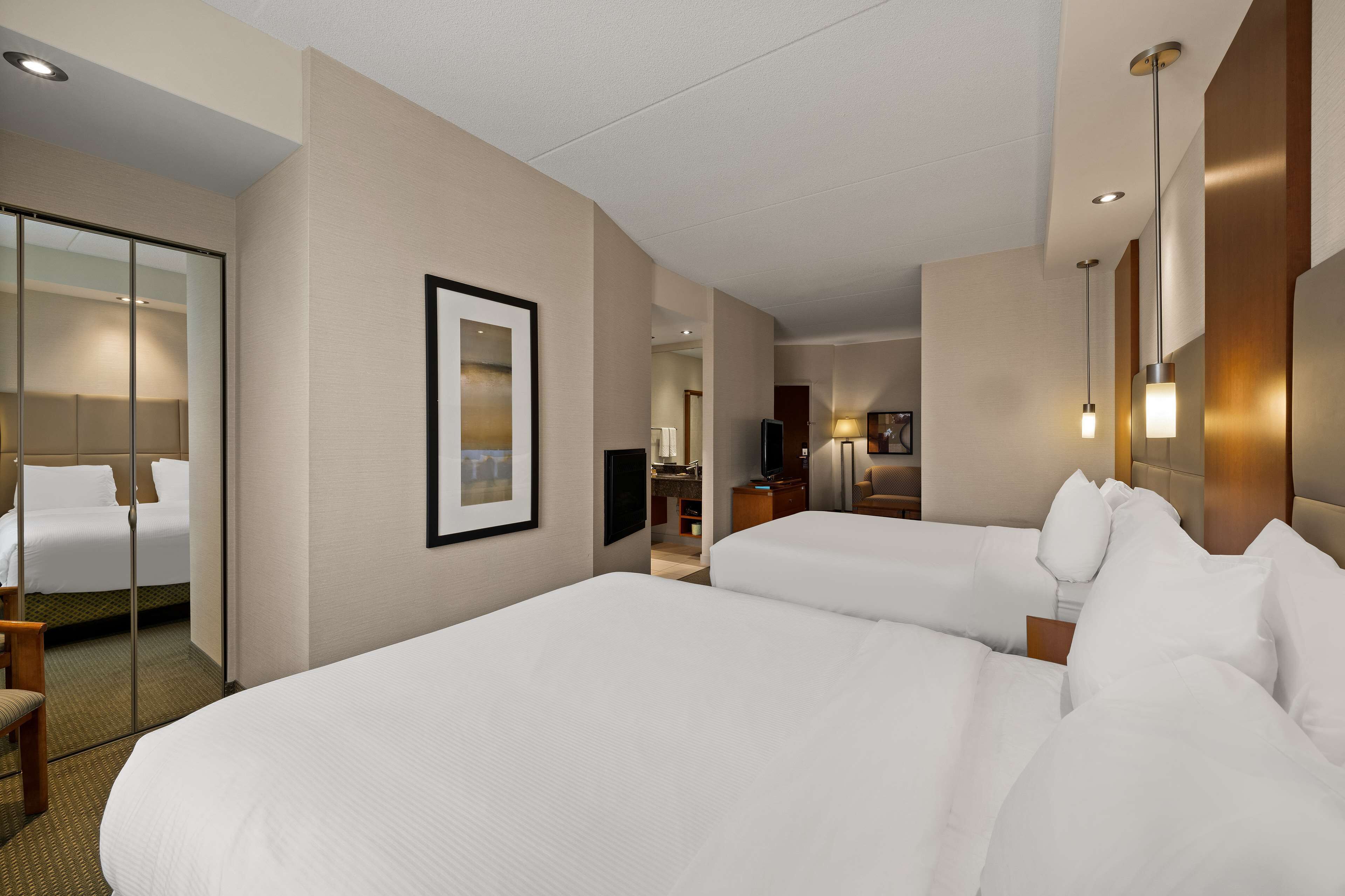suite, 2 queen beds, non smoking, kitchenette (with sofabed) | in-room safe, desk, laptop workspace, iron/ironing board