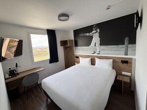 Premium bedding, desk, blackout curtains, soundproofing