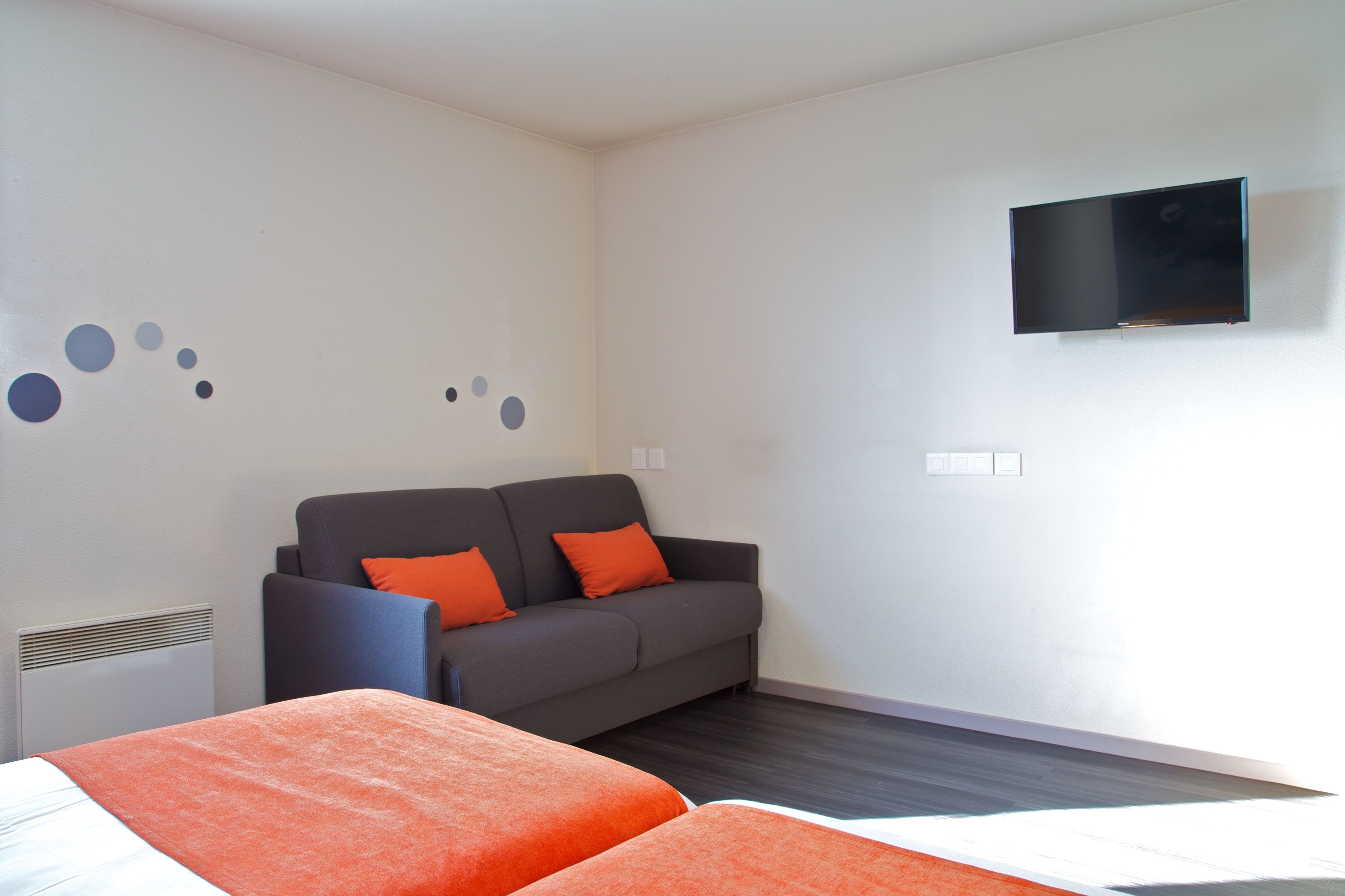 comfort family room | premium bedding, desk, blackout curtains, soundproofing