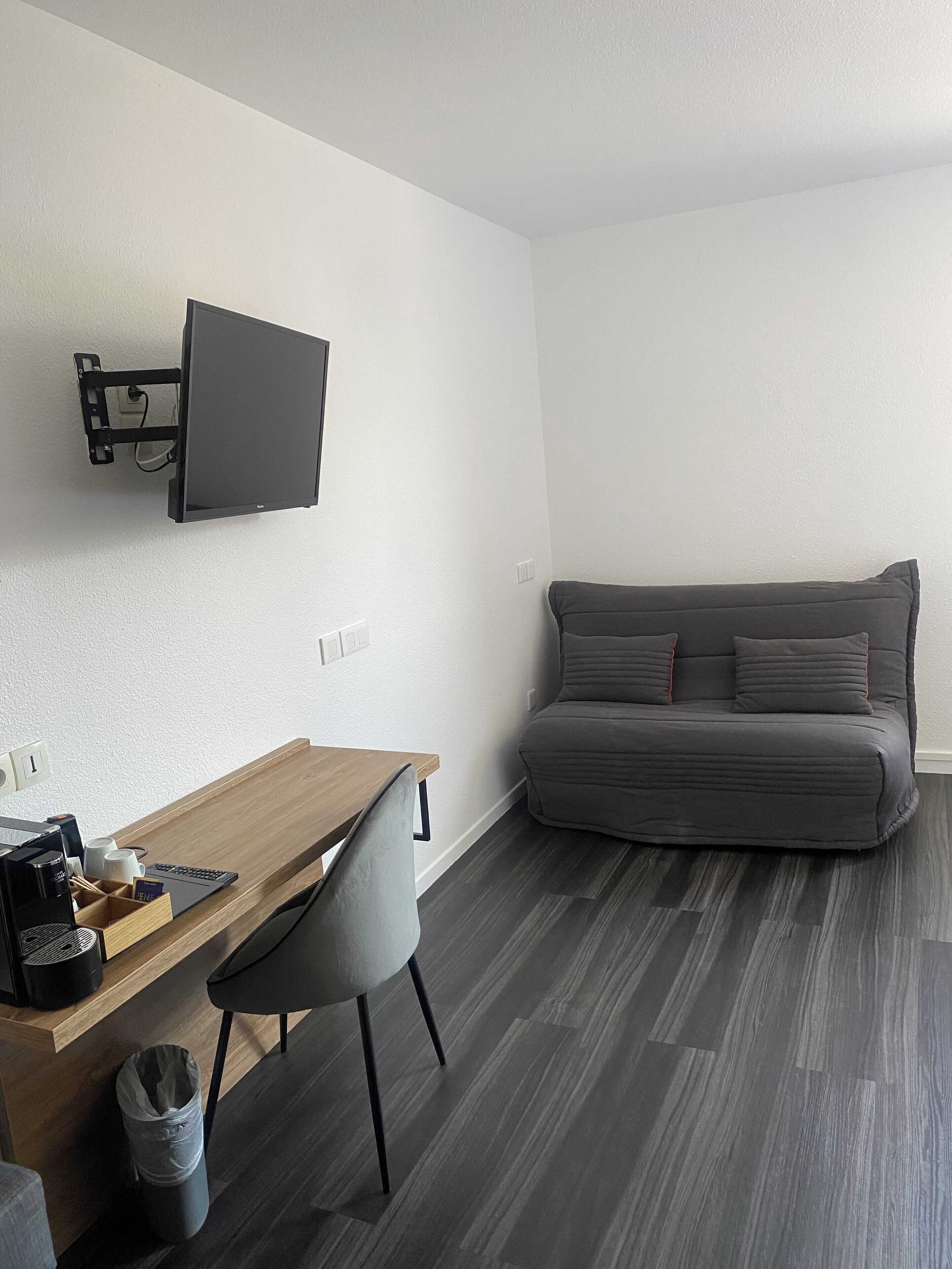 comfort family room | living area | flat-screen tv