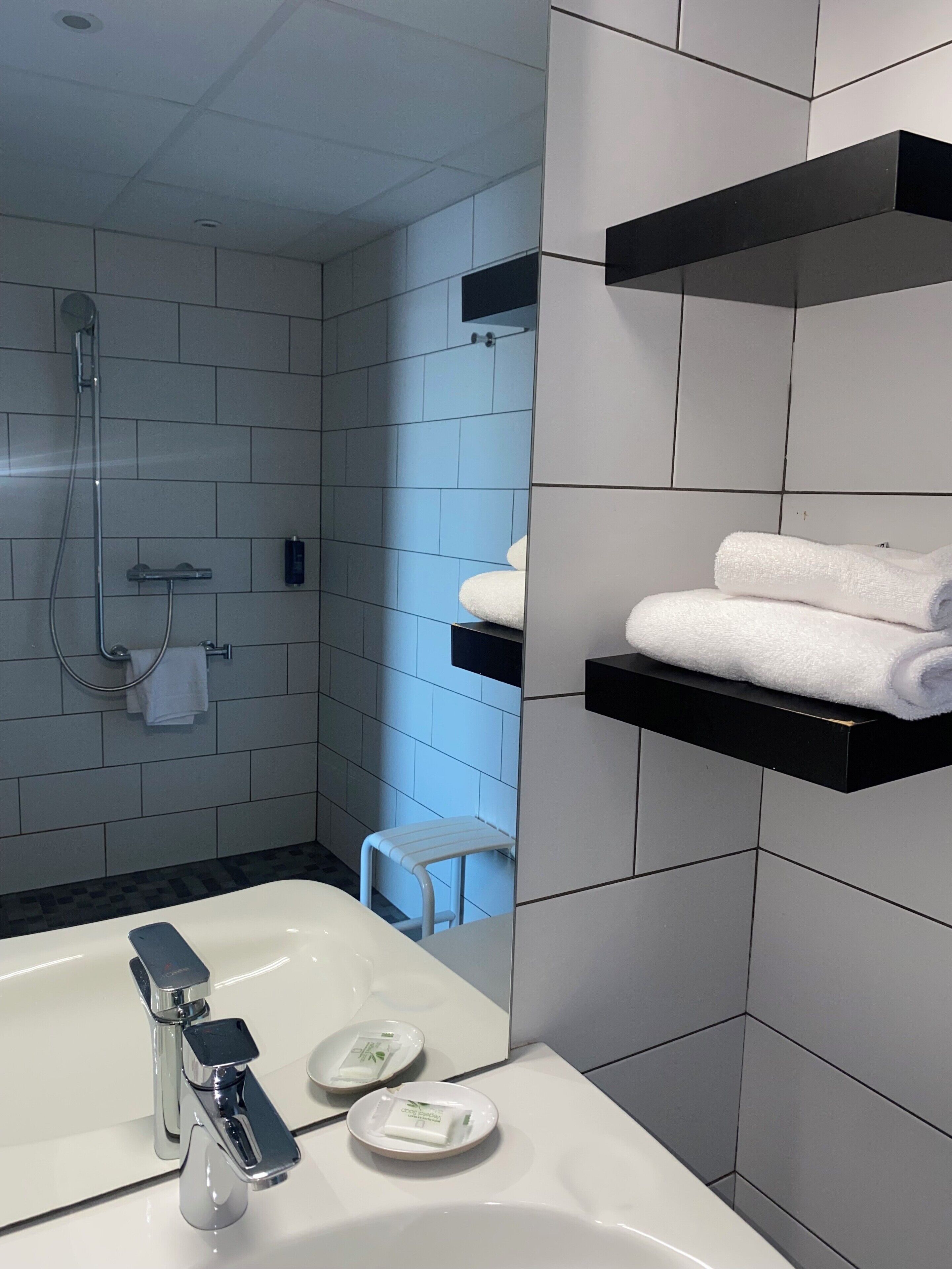 premium studio | bathroom | free toiletries, towels