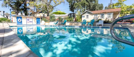 Seasonal outdoor pool, pool loungers