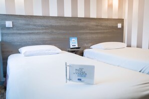 Premium bedding, desk, free WiFi, bed sheets