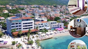 Un hotel costero con varios pisos, una zona de playa con sombrillas y una vista despejada del mar.