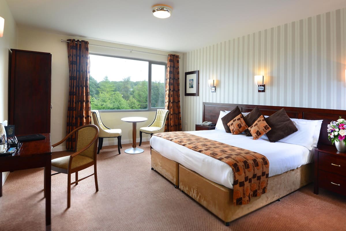 1 bedroom, desk, blackout curtains, iron/ironing board