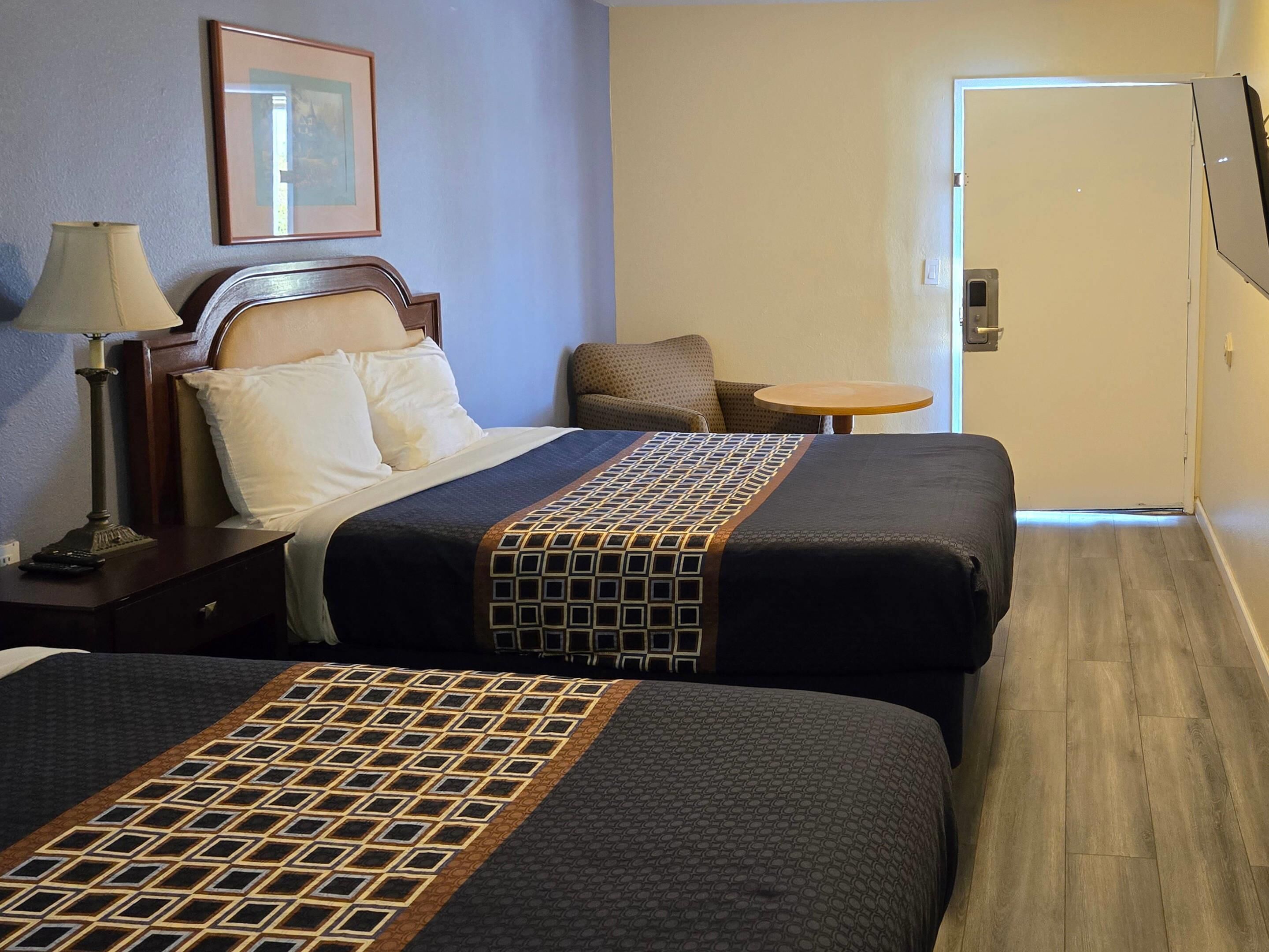 Suite, Multiple Beds, Non Smoking | Down comforters, individually decorated, individually furnished, desk