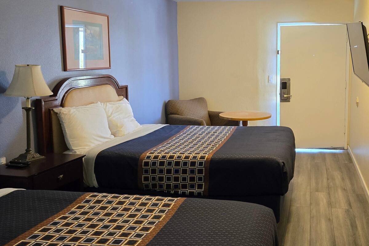Suite, Multiple Beds, Non Smoking | Down comforters, individually decorated, individually furnished, desk