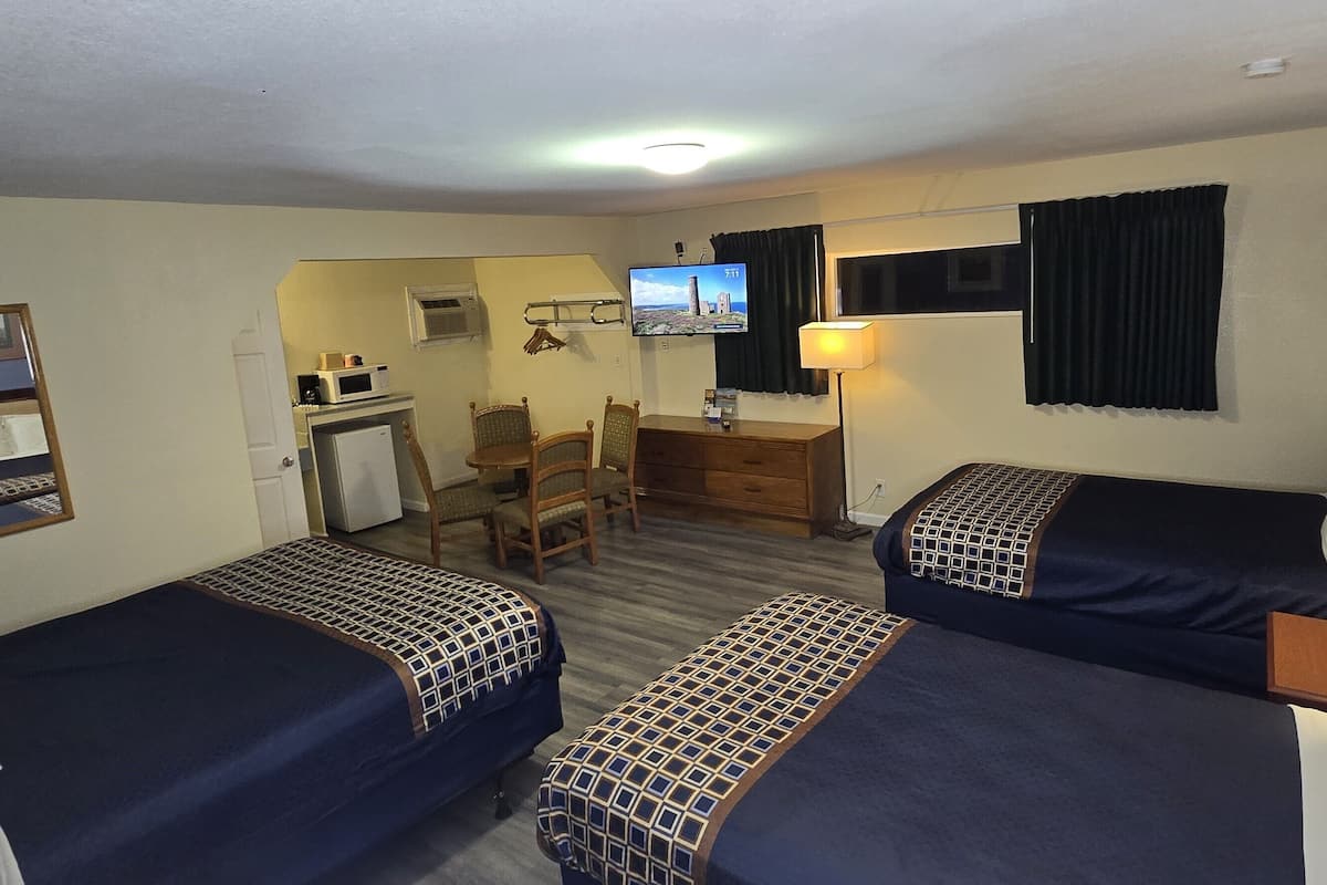 Suite, Multiple Beds, Non Smoking | Down comforters, individually decorated, individually furnished, desk