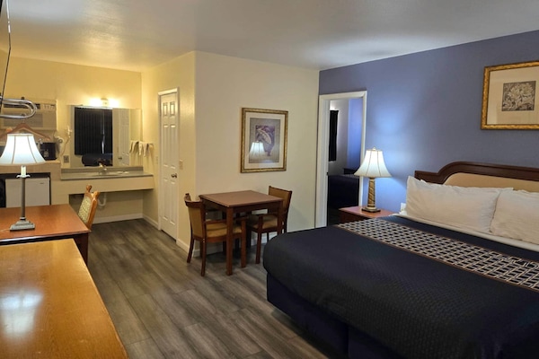 Suite, Multiple Beds, Non Smoking | Down comforters, individually decorated, individually furnished, desk