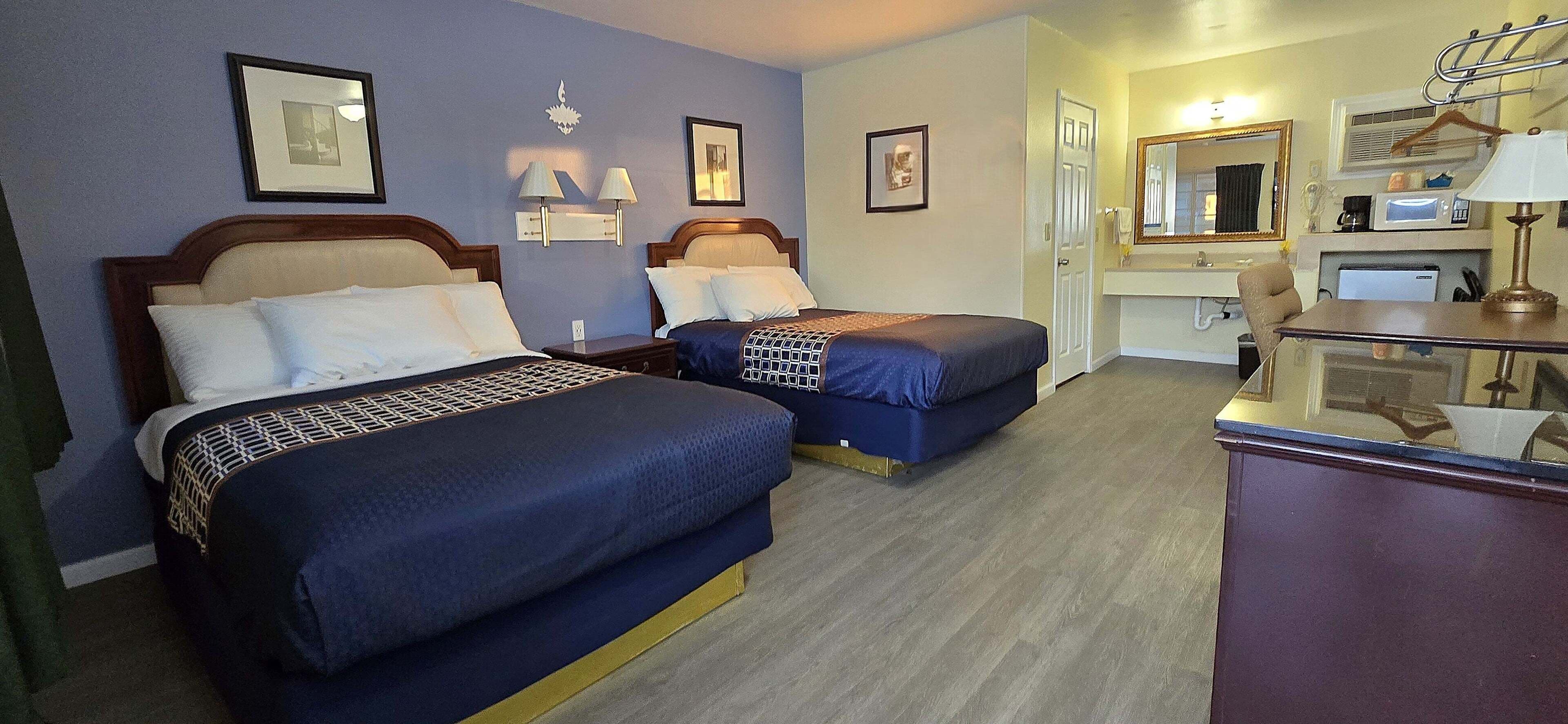 Standard Room, 2 Double Beds, Non Smoking | Down comforters, individually decorated, individually furnished, desk