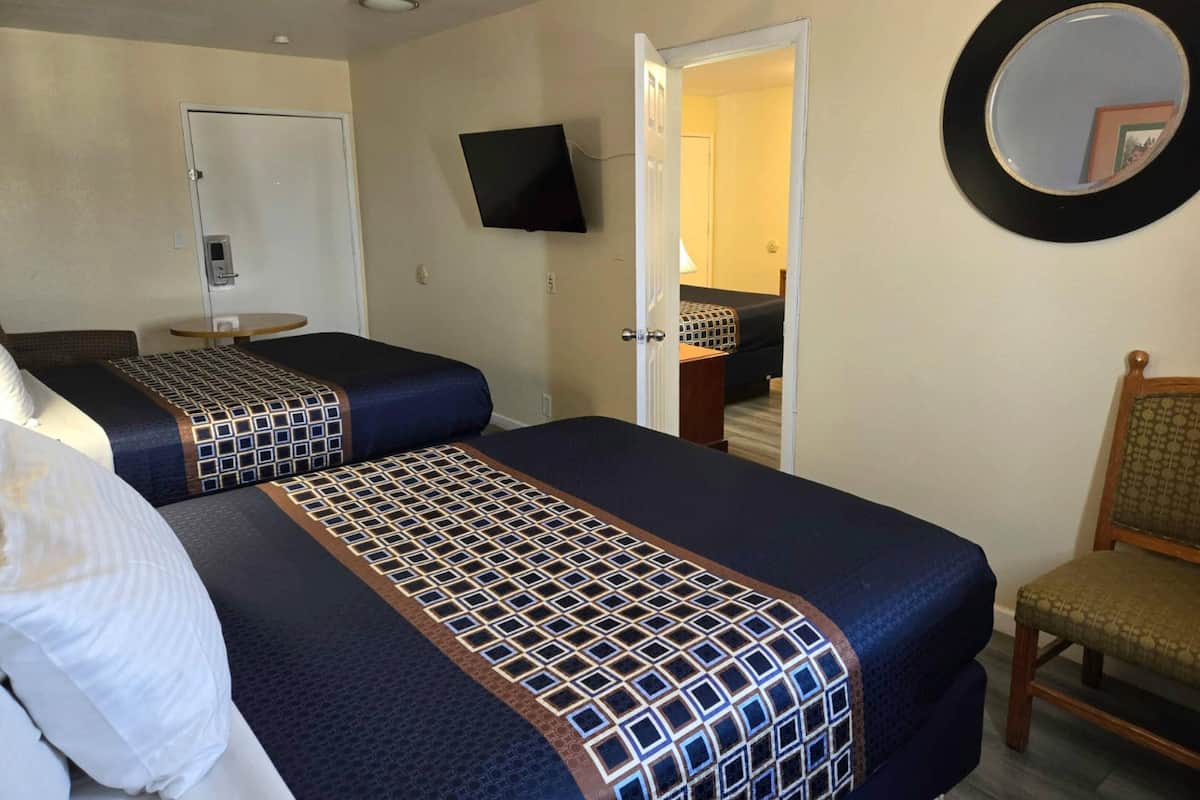 Suite, Multiple Beds, Non Smoking | Down comforters, individually decorated, individually furnished, desk