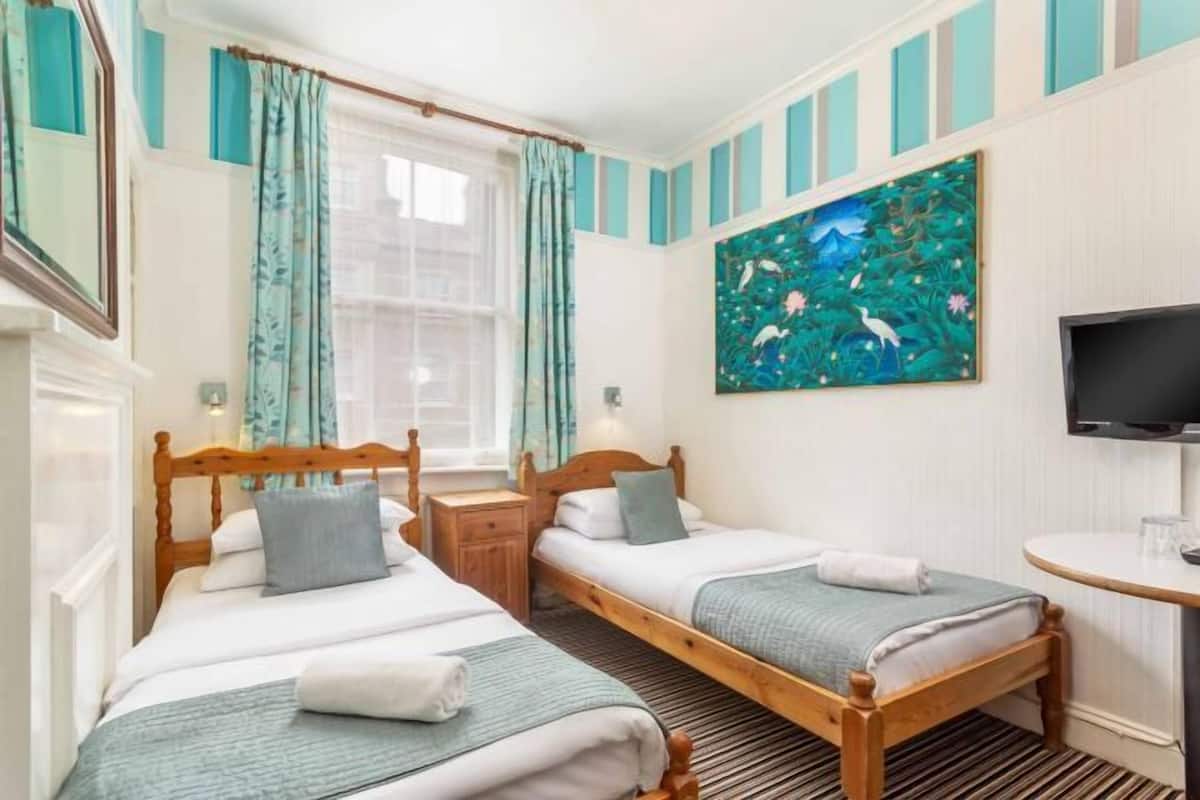 Blackout curtains, iron/ironing board (on request), free WiFi