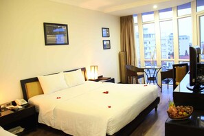 Family Triple Room | Minibar, in-room safe, desk, blackout drapes - Orchid Hotel (Hue)