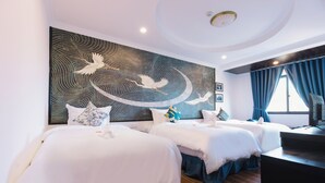A hotel room with two beds, a large wall mural, and a desk. - Orchid Hotel (Hue)