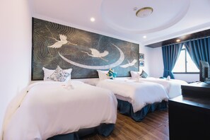 Family Triple Room | Minibar, in-room safe, desk, blackout drapes - Orchid Hotel (Hue)