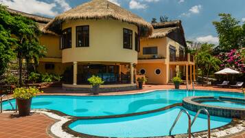 Outdoor pool, pool umbrellas, sun loungers