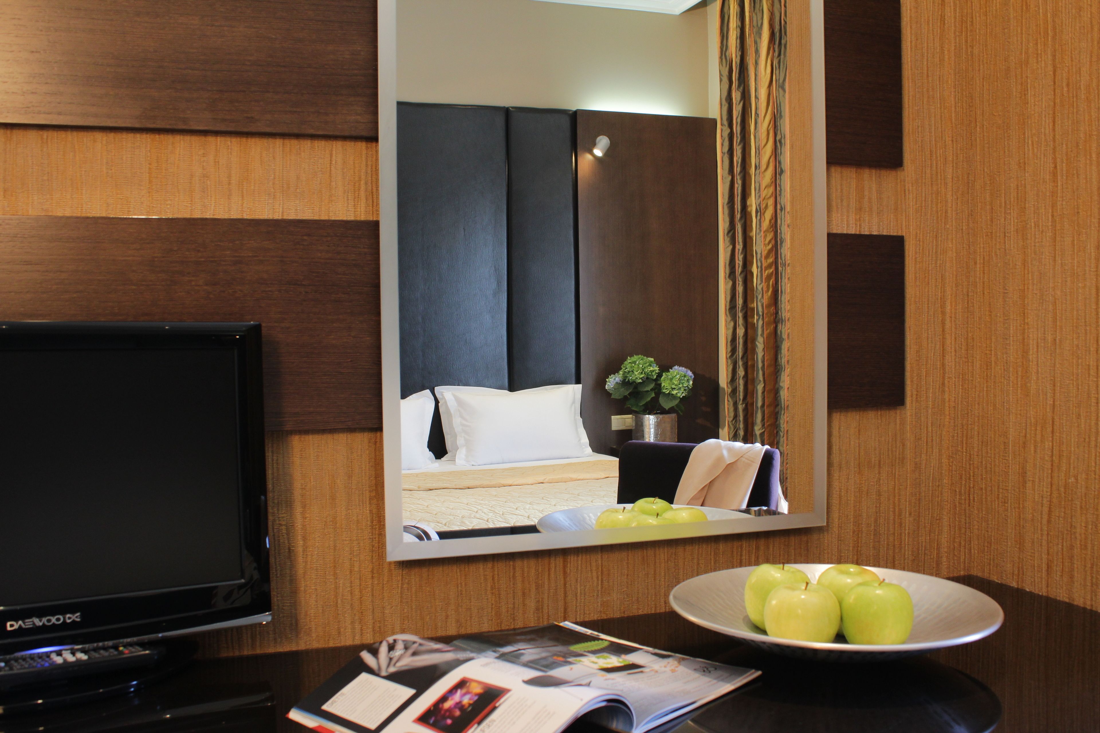 superior room, balcony, city view | living area | 30-inch flat-screen tv with cable channels, tv