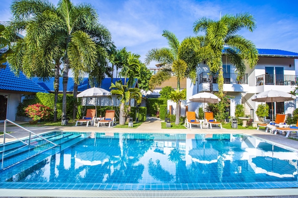 Outdoor pool, pool umbrellas, sun loungers