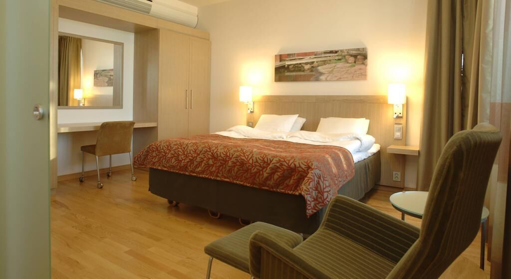 Hypoallergeen beddengoed, een minibar, een kluis op de kamer, een bureau