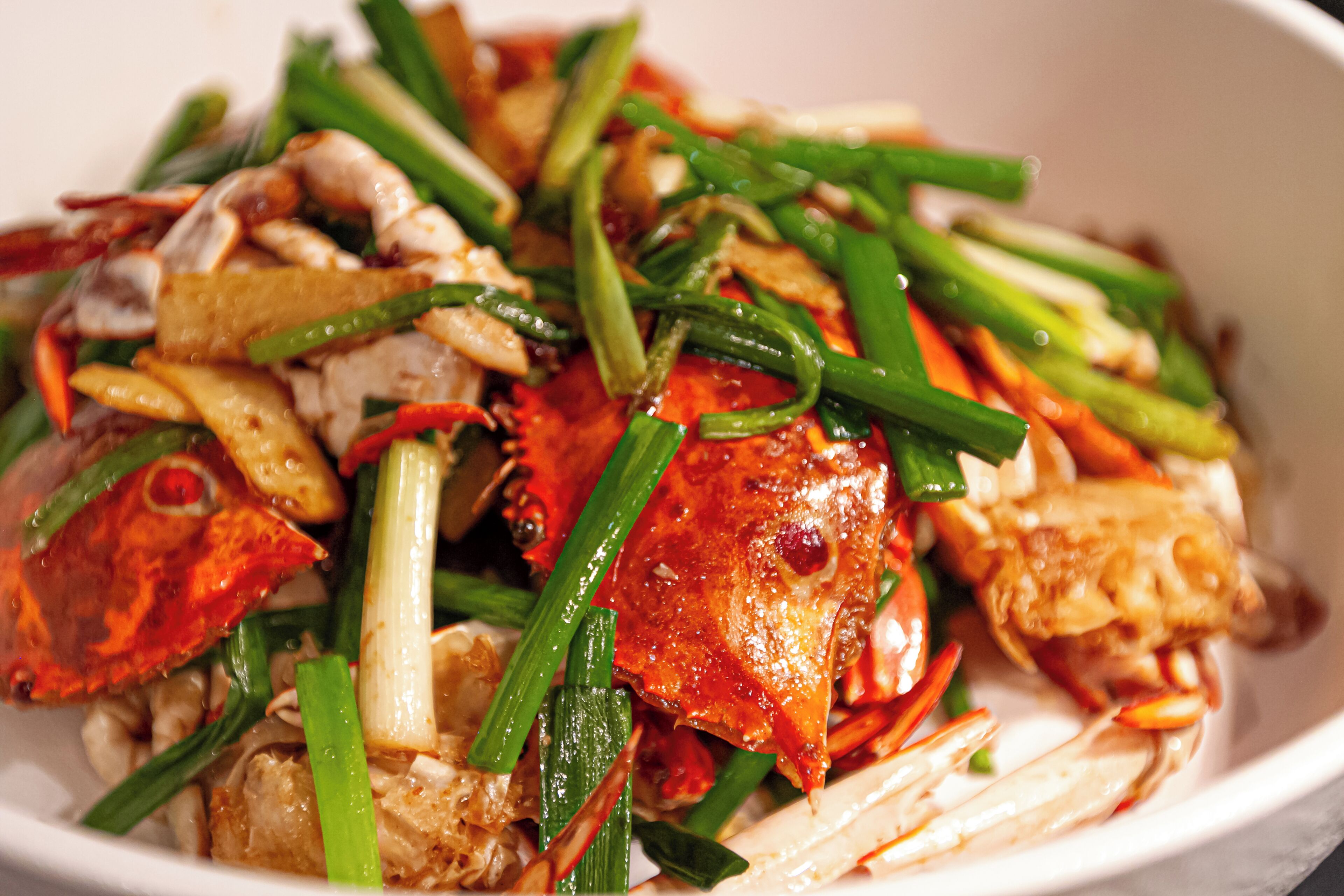 A dish with seafood and vegetables.