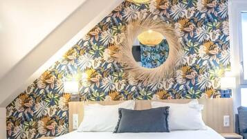 Suite | In-room safe, individually decorated, desk, blackout drapes