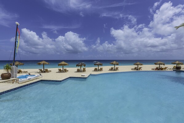 2 outdoor pools, pool umbrellas, pool loungers