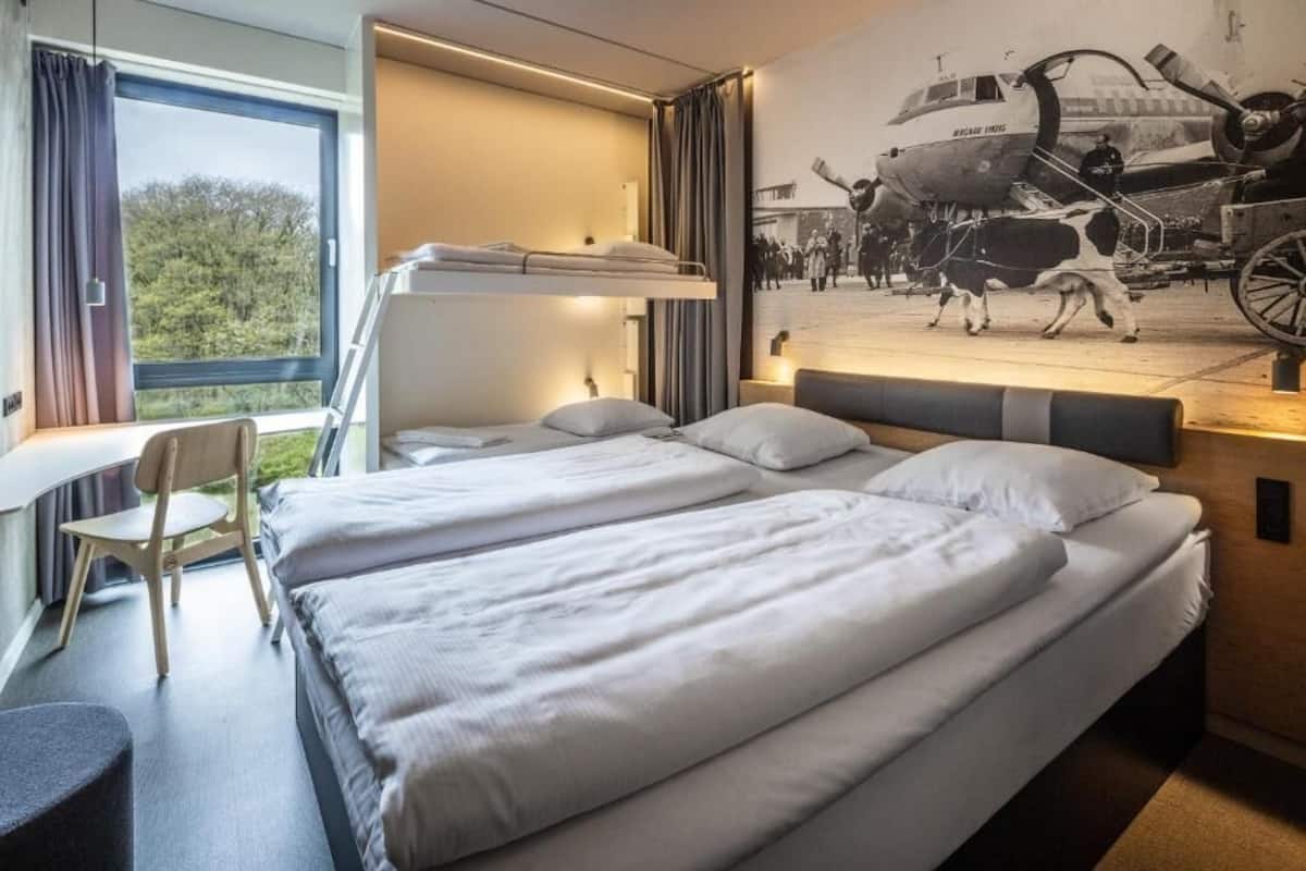 Hypo-allergenic bedding available, desk, laptop workspace, soundproofing