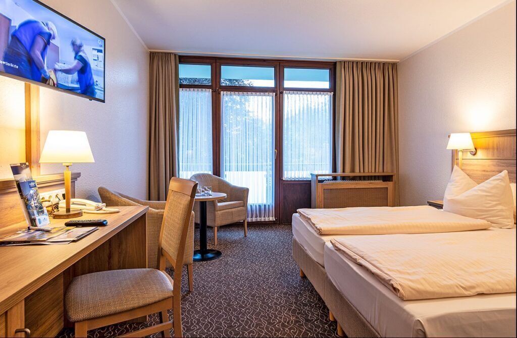 Hypo-allergenic bedding available, in-room safe, desk, laptop workspace