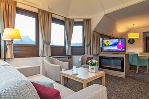 Panoramic Penthouse | Living area | Flat-screen TV