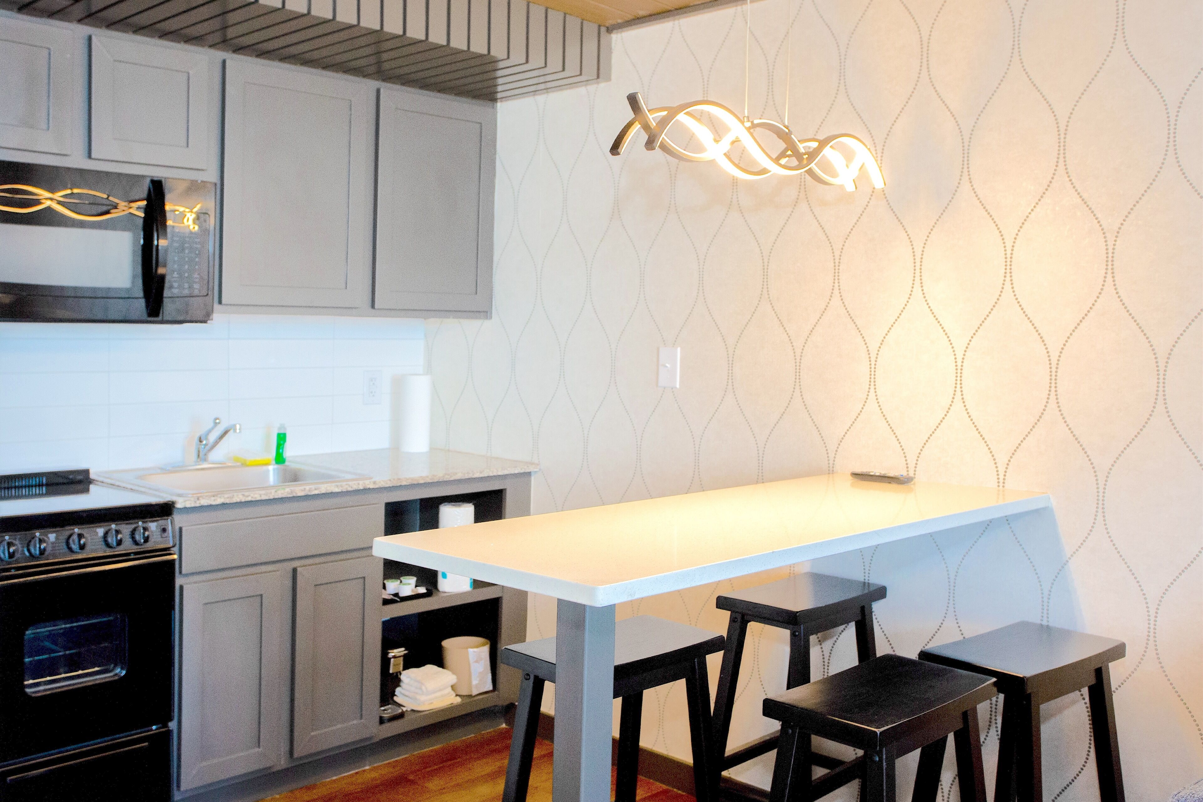 deluxe room, 1 king bed with sofa bed, balcony, ocean view | private kitchen | mini-fridge, microwave, oven, stovetop