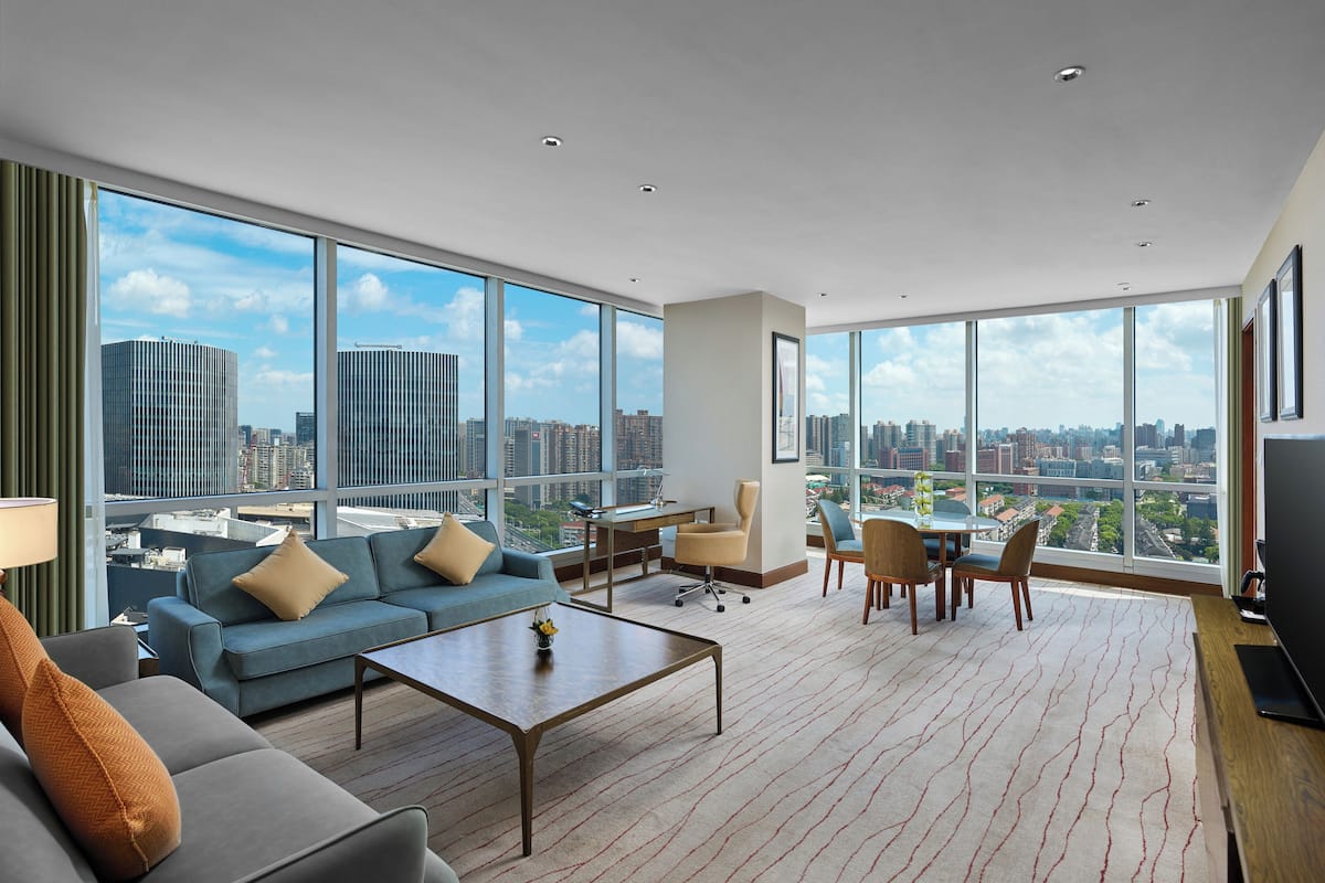 Suite, 1 Bedroom, City View, Corner | Living room | Flat-screen TV, DVD player
