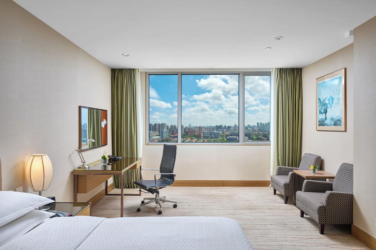 Room, 1 King Bed, City View | 1 bedroom, premium bedding, minibar, in-room safe