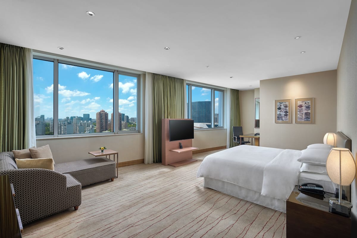 Room, 1 King Bed, City View | 1 bedroom, premium bedding, minibar, in-room safe