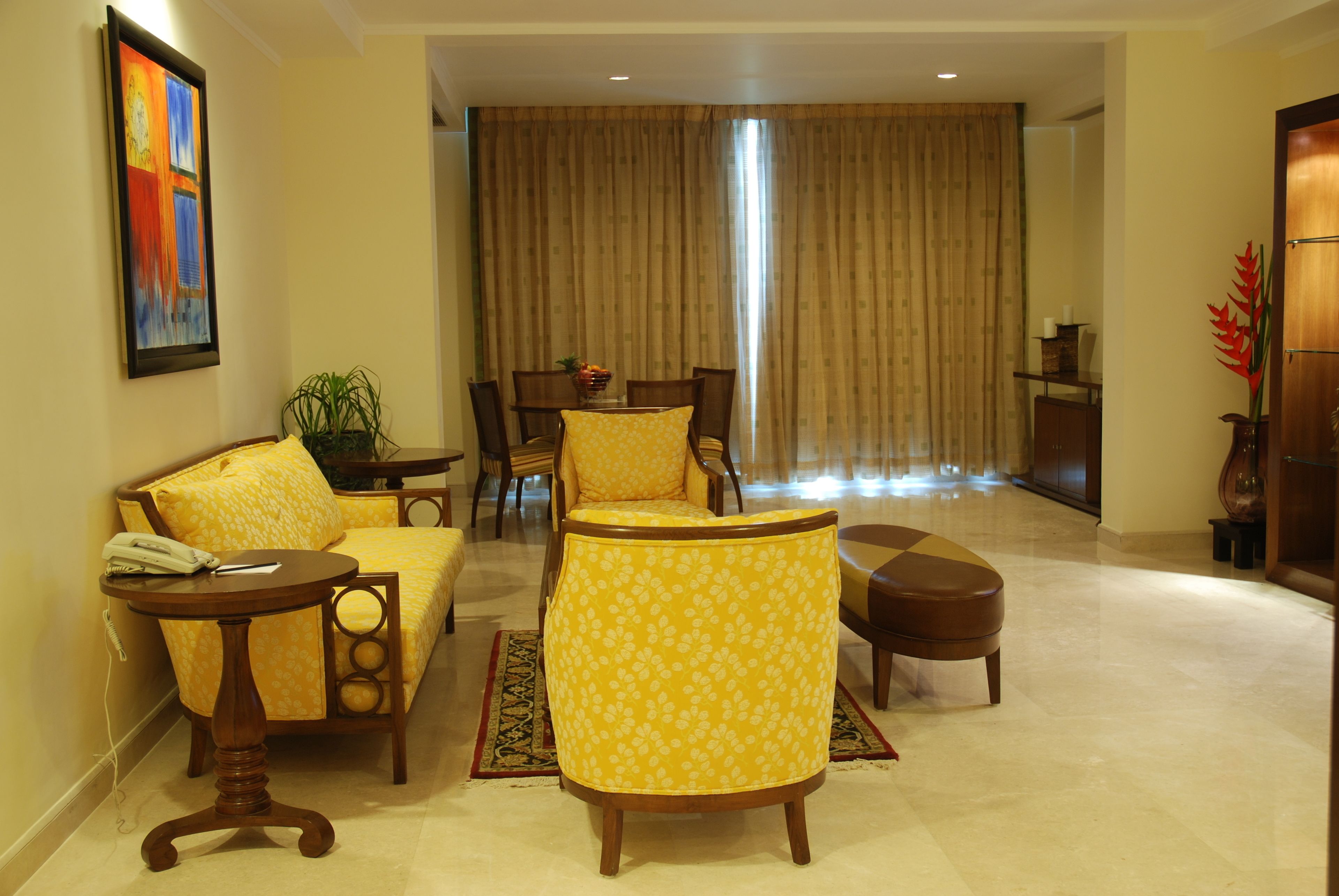 room (lalit legacy first floor) | living area | 42-inch plasma tv with cable channels, tv, dvd player