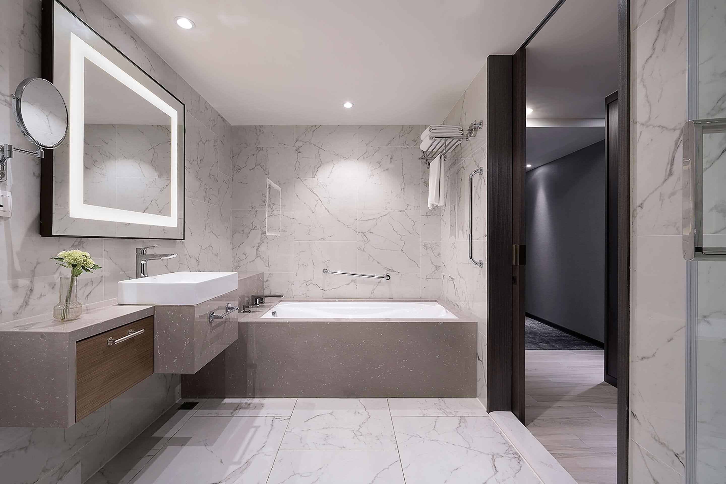 hair dryer, towels, shampoo, toilet paper