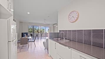 Suite, 1 Bedroom | Private kitchen | Fridge, microwave, stovetop, dishwasher