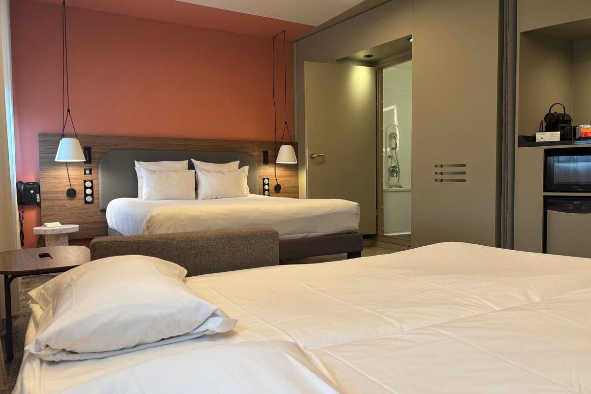 superior suite, multiple beds | premium bedding, pillow-top beds, in-room safe, desk
