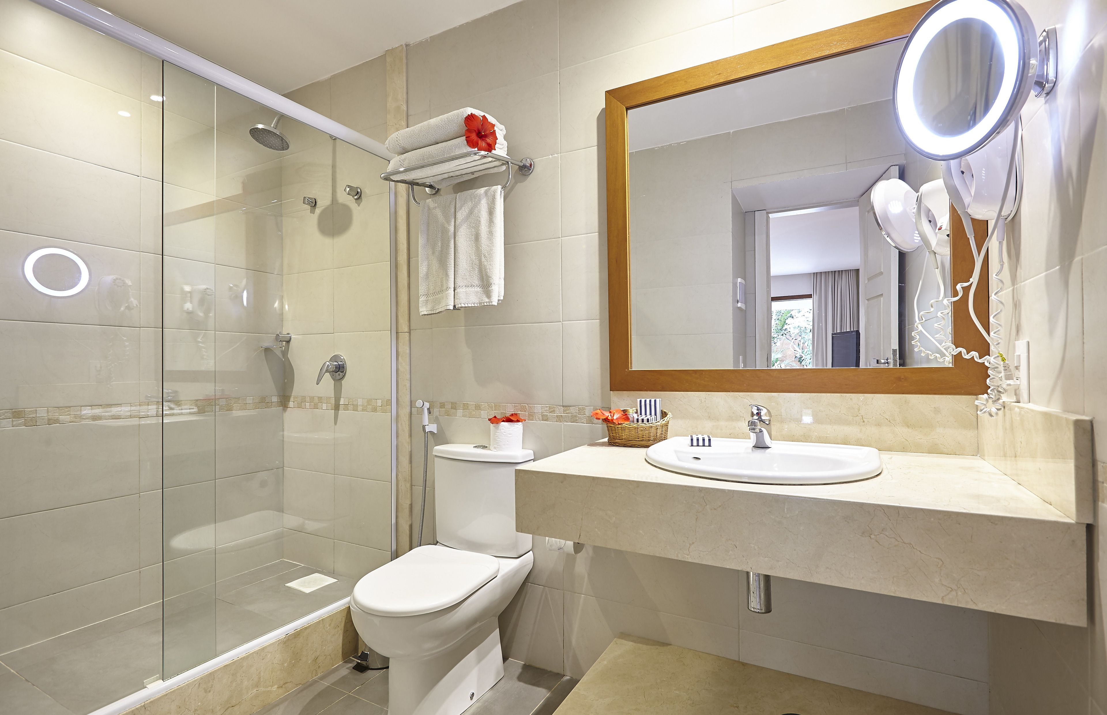 junior suite | bathroom | shower, designer toiletries, hair dryer, towels