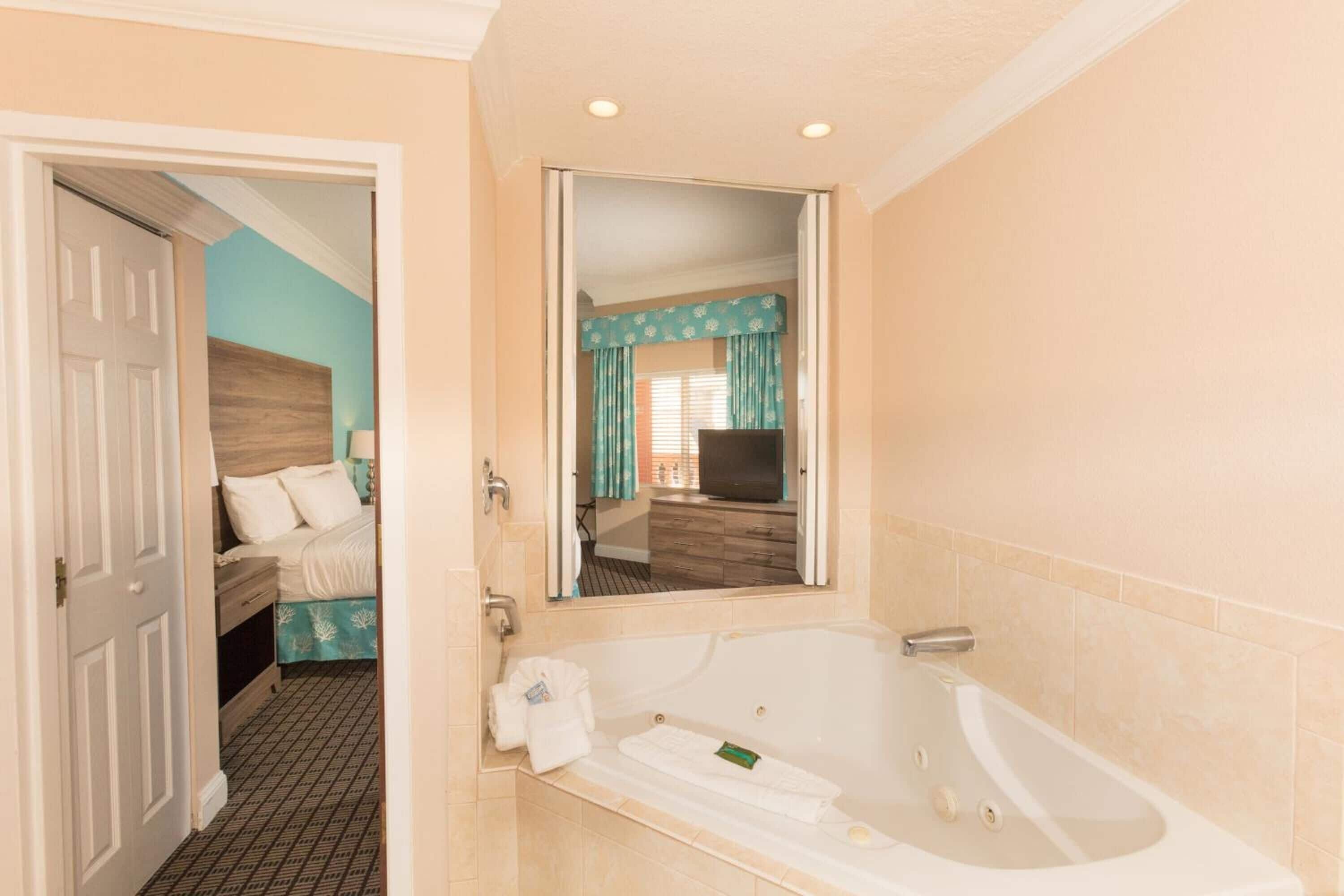 combined shower/bathtub, rainfall showerhead, designer toiletries