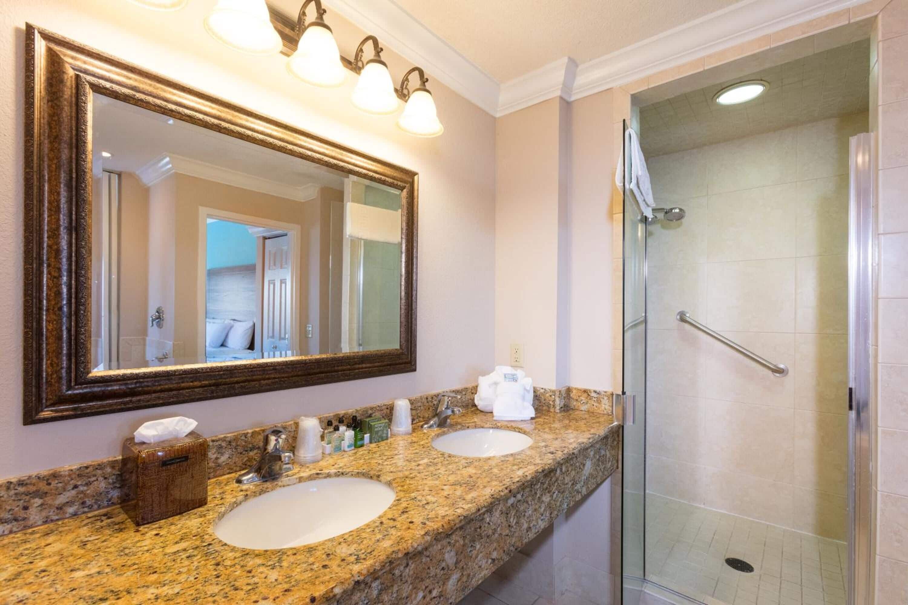 combined shower/bathtub, rainfall showerhead, designer toiletries