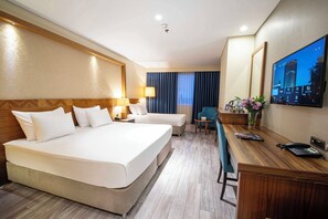 Superior Twin Room | Minibar, in-room safe, desk, iron/ironing board