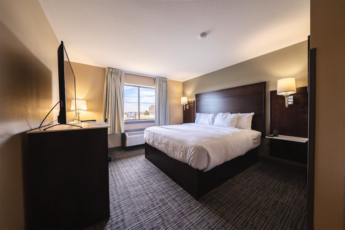 desk, laptop workspace, blackout curtains, iron/ironing board