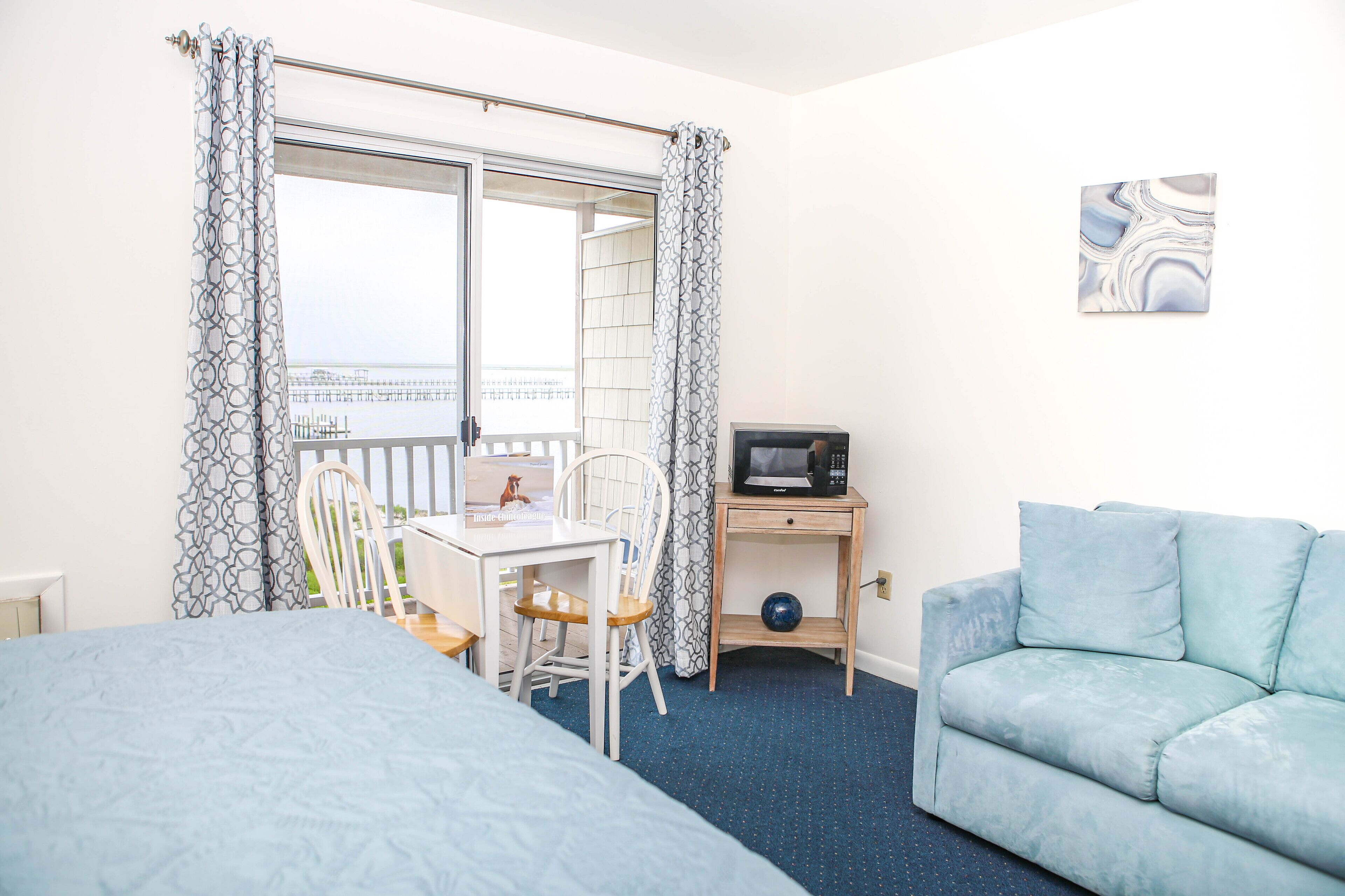 deluxe room, 2 queen beds, sea view | 1 bedroom, blackout curtains, iron/ironing board, free wifi